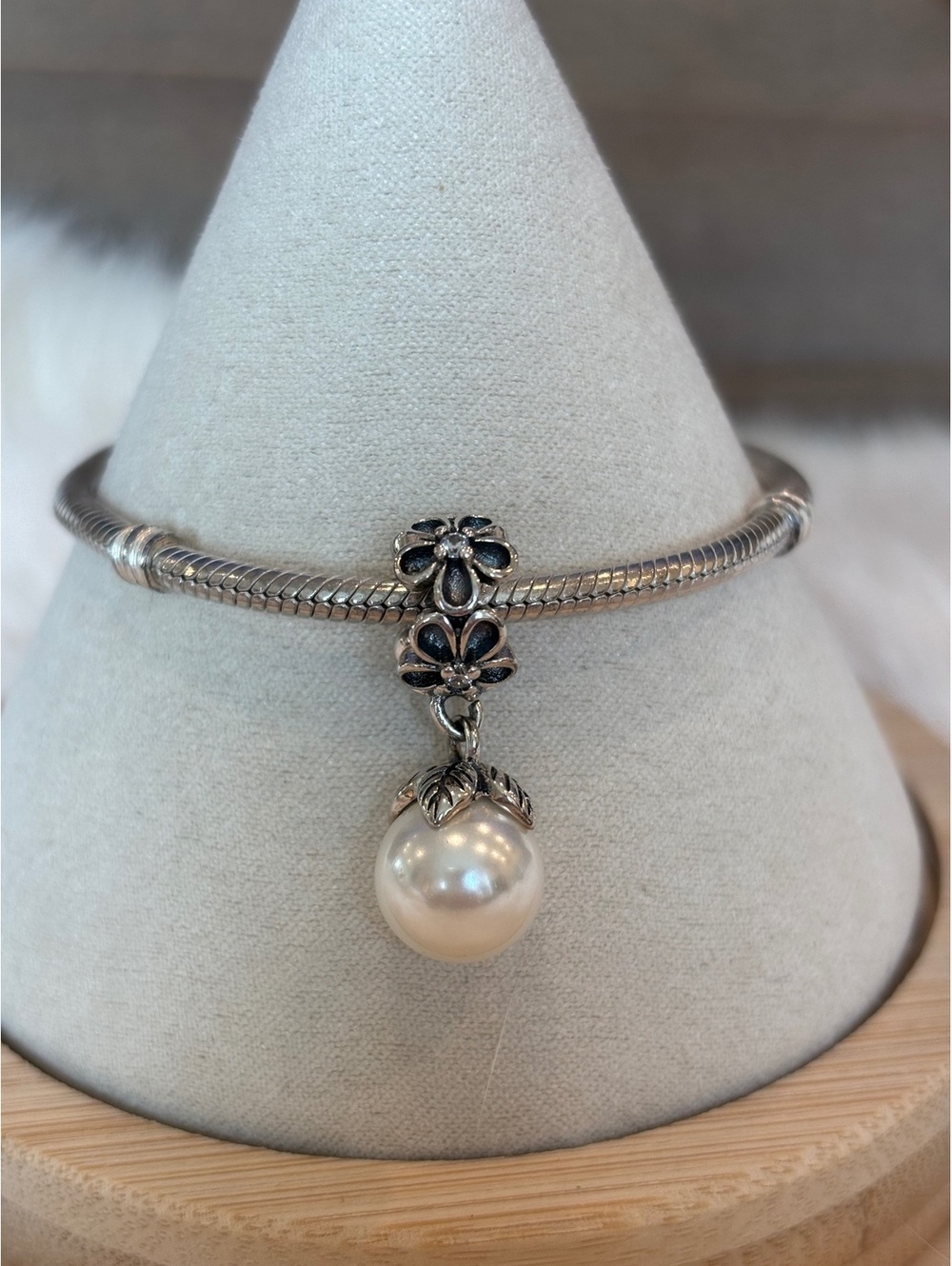 Pandora pearl flower dangle charm.